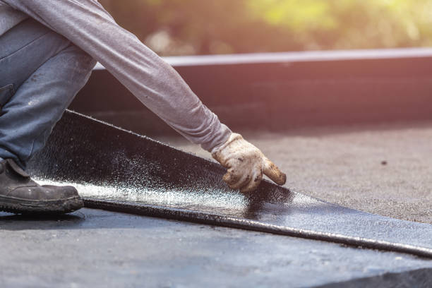Professional Basement Waterproofing technician working in Farmington, NY